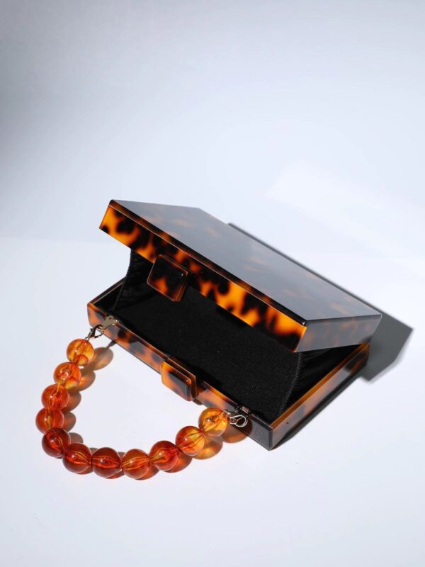 sama acrylic beaded clutch in amber 8